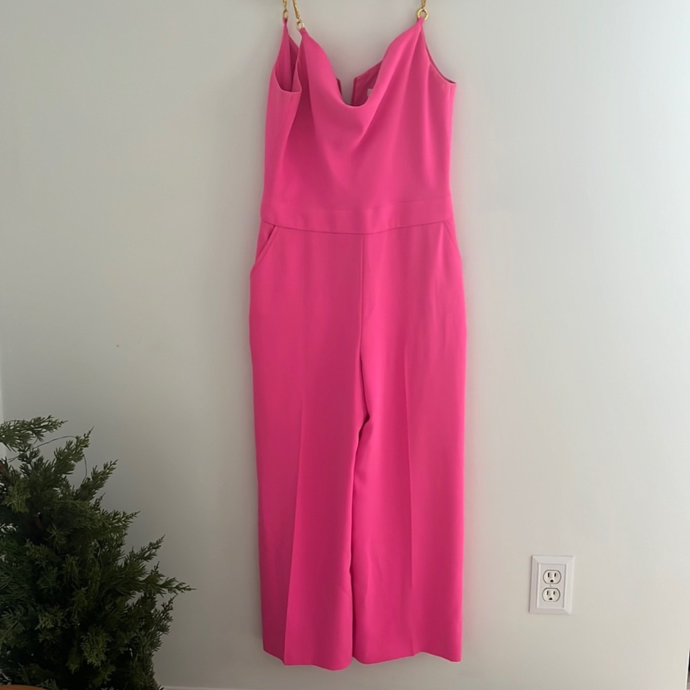 TRINA TURK BRIGHT PINK JUMPSUIT WITH GOLD CHAIN STRAPS